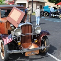 copper colored antique car